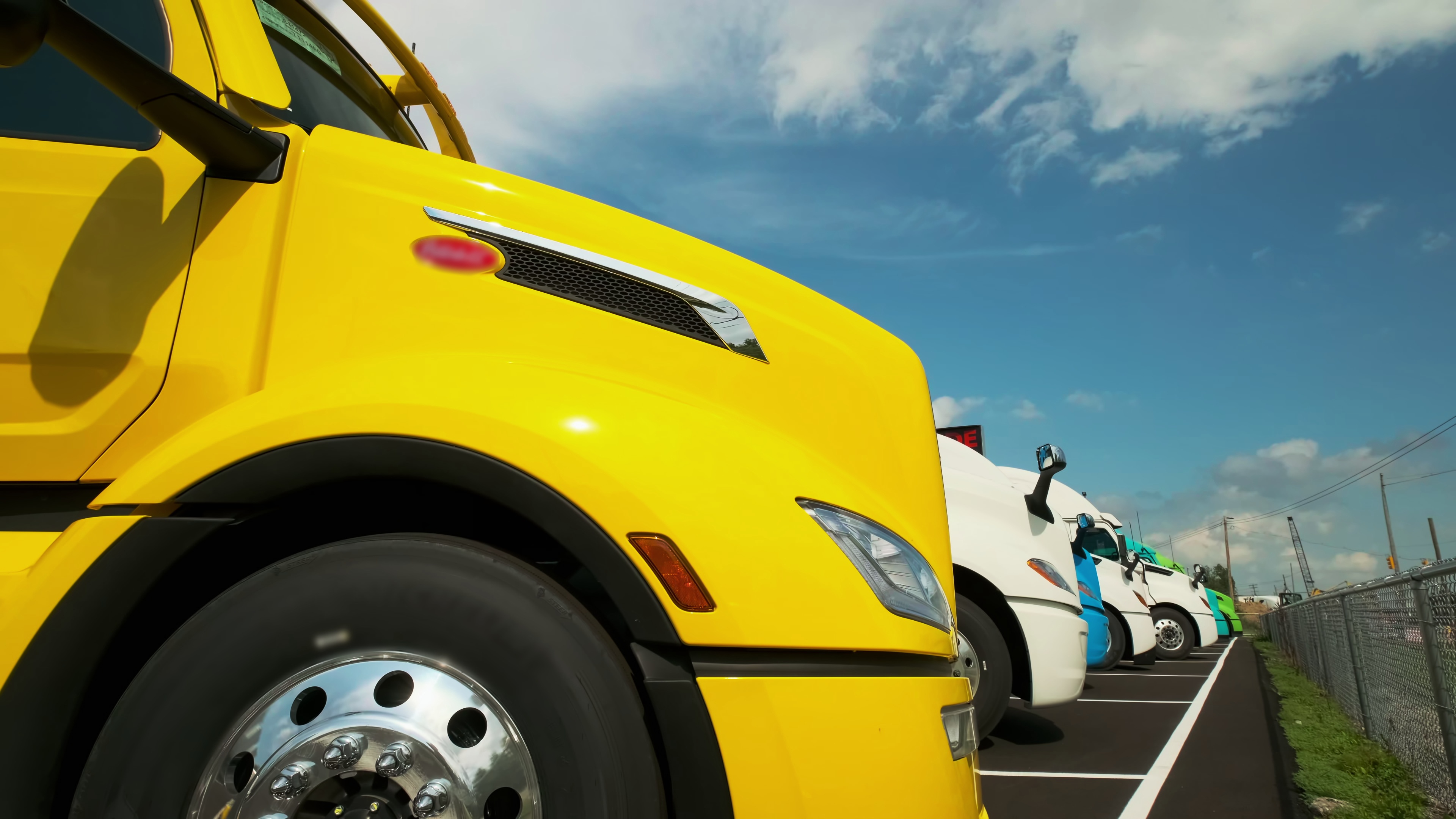 Trucks parked at a commercial yard