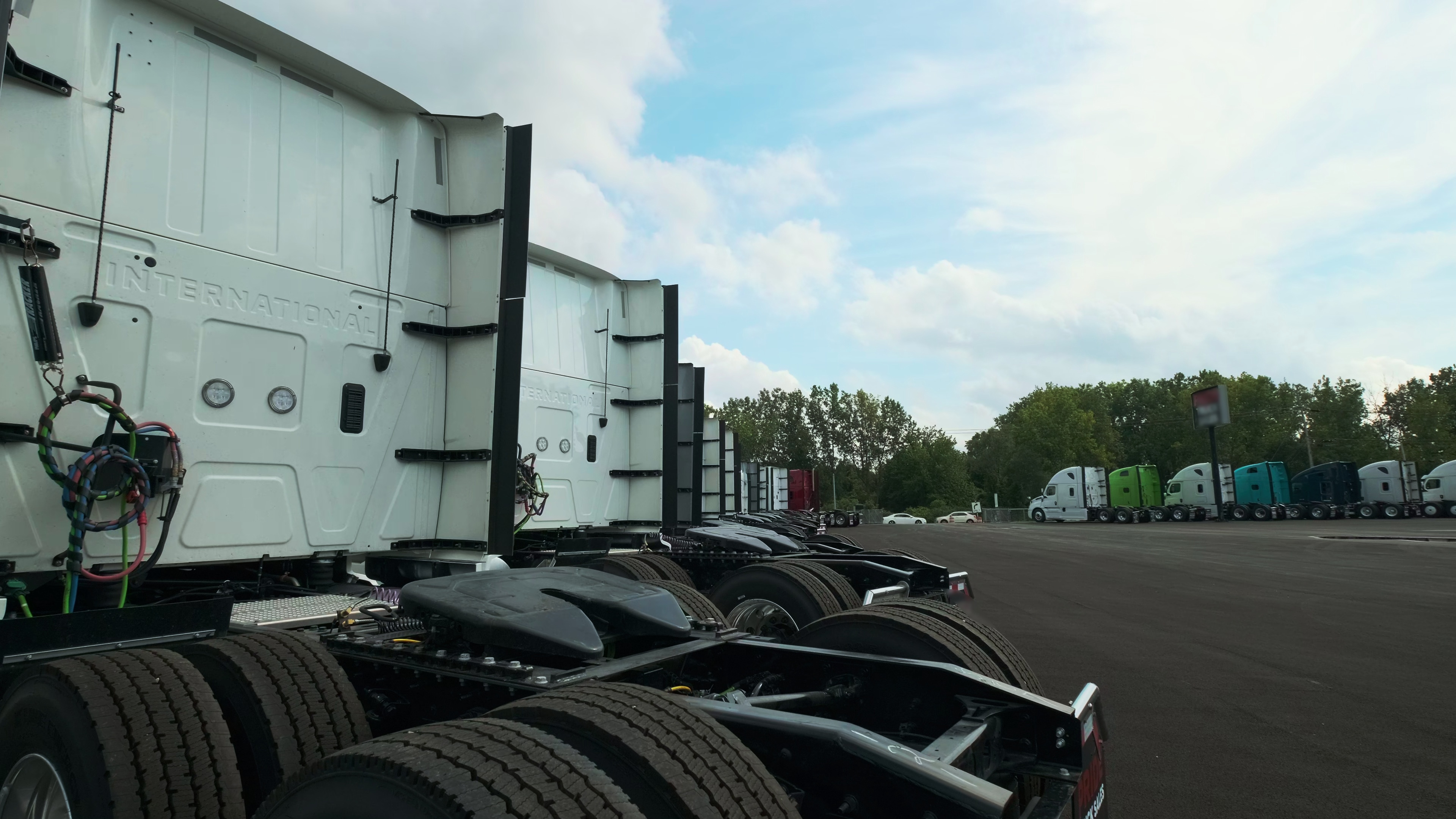 Trucks parked in a commercial yard