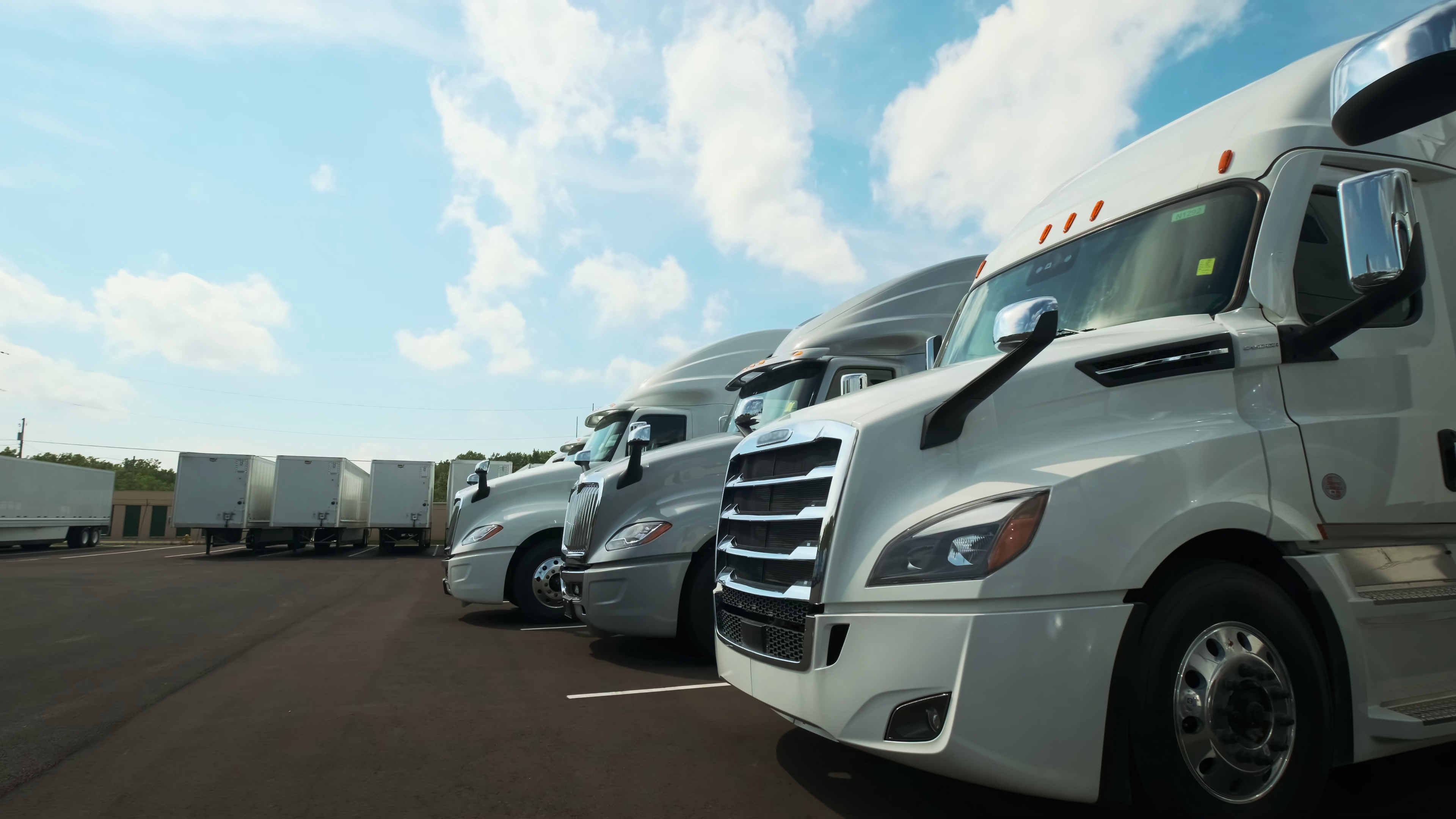 Commercial trucks representing the Class 8 fleet segment that Kodiak AI autonomous systems are designed to serve at scale