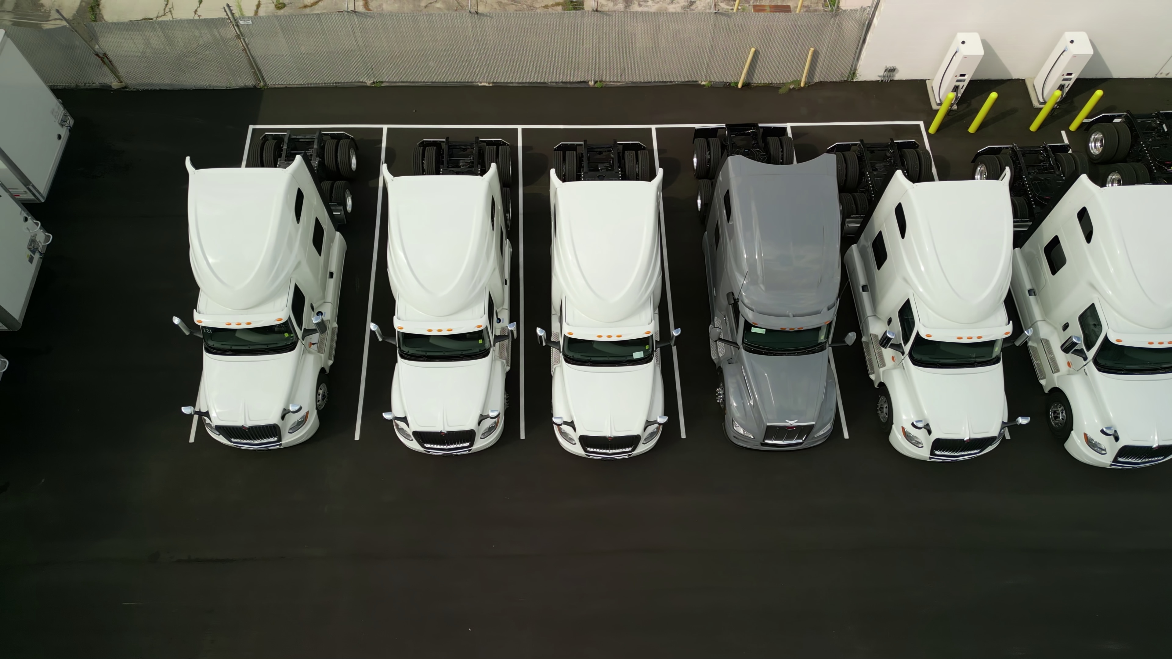 Aerial top view of trucks staged in dispatch yard